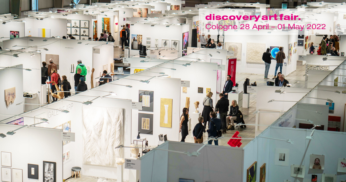 Hall view of the Discovery Art Fair with artworks by international artists presented in fair booths
