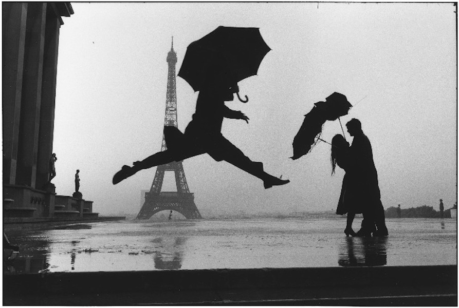 Elliott Erwitt - Umbrella Jump, Paris, France, 1989